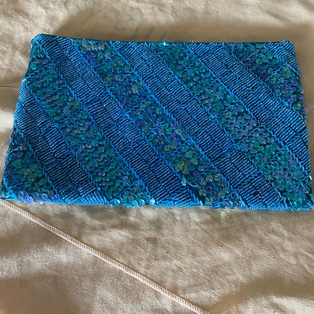 Turquoise sequined clutch, snap buttons closure- new, imported